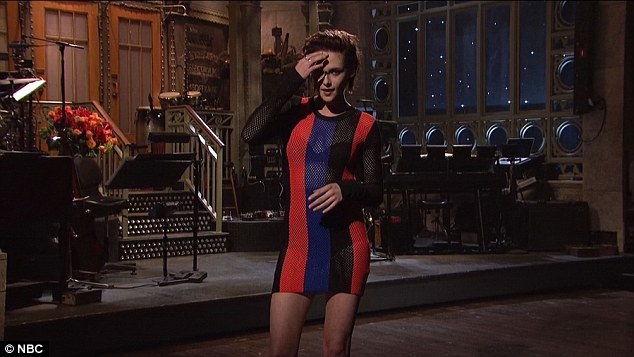 Sheer: Kristen then appeared on stage, wearing a figure-hugging black, red and blue crochet dress to introduce the musical guest