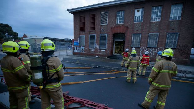 Firefighters attending an electrical fire at the Telstra exchange on Frith Street in Brunswick on Thursday.