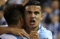 City's Tim Cahill celebrates after scoring in round two against Victory.