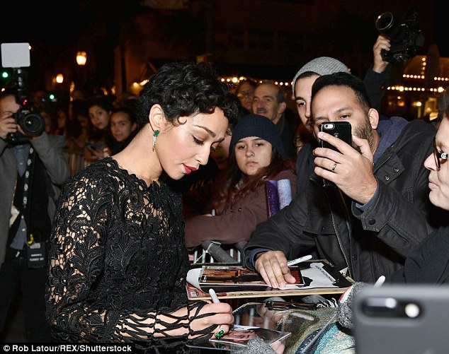 Quirky: The 35-year-old Ethiopian-Irish actress opted for a fitted floor-length gown, which featured a sheer and intricately detailed top-layer