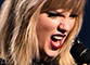 Taylor kicks up a storm at pre-Super Bowl party