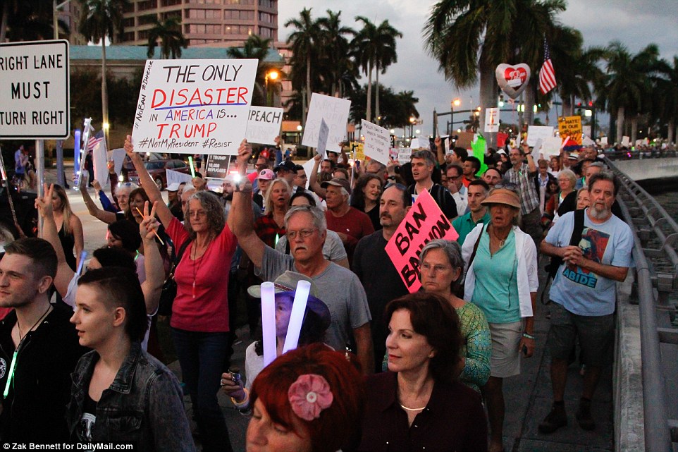 The president was at his Mar-a-Lago estate in Florida when the legal mayhem erupted and seemed furious his celebratory weekend was interrupted by the ruling as demonstrators protested him nearby in West Palm Beach. Nearly 3,000 protesters took to the streets to object Trump and his polices 