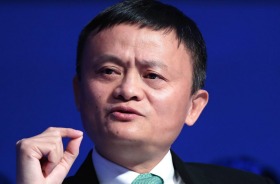 Jack Ma, billionaire and chairman of Alibaba Group Holding Ltd., gestures as he speaks during a panel session at the ...