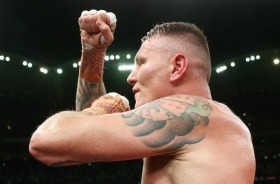 ADELAIDE, AUSTRALIA - FEBRUARY 03: Australian boxer Danny Green celebrates after deafeating Anthony Mundine in their ...