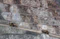 Dump trucks operate in an open pit at the Oyu Tolgoi copper-gold mine, jointly owned by Rio Tinto. The Oyu Tolgoi ...