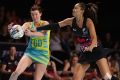 Dynamic: Maria Tutaia competes for the ball against Kate Shimmin in the final of the Fast5 Netball Series.