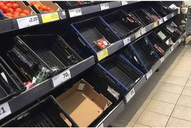 Hardly any tomatoes remained at a supermarket in Exeter, Devon, on Friday as the food shortage continued 