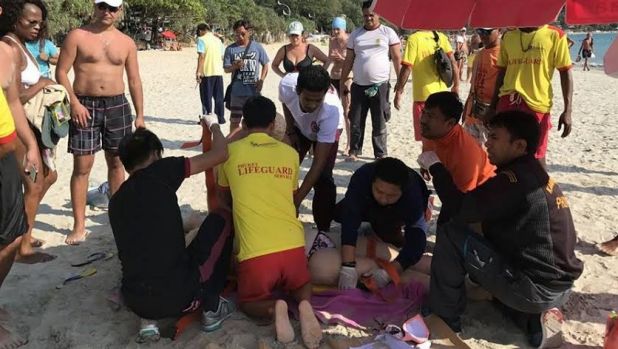 Lifesavers try to save the life of Victorian tourist Emily Jayne Collie on Phuket's Karen Beach.