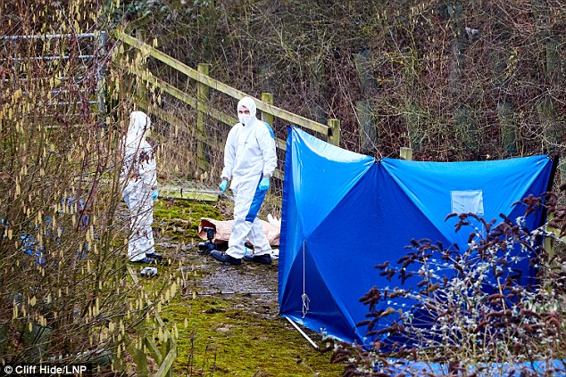 Scenes of crimes officers are examining the scene near High Wycombe, Buckinghamshire 