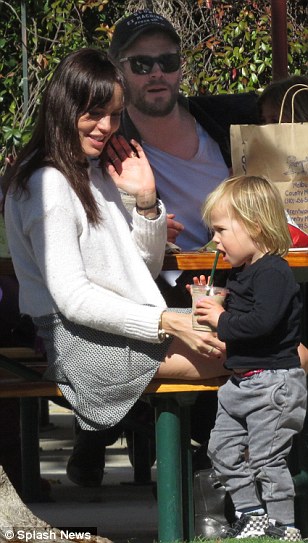 Doting: Taking a hands on approach with Chris and Elsa's two-year-old Tristan, Marta smiled as she oversaw the youngster sip from a plastic cup