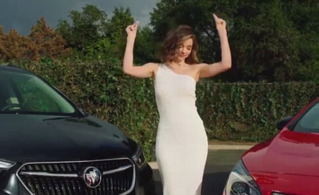 'My best celebration moves!' Miranda Kerr dances as she promotes her Super Bowl advert