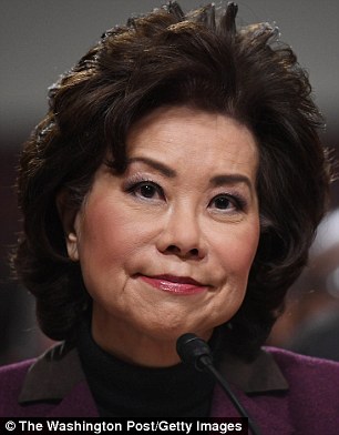 Elaine Chao (pictured), Donald Trump's new transportation secretary, and former New York City Mayor Rudy Giuliani (right) both gave paid speeches to a 'cult-like' Iranian exile group