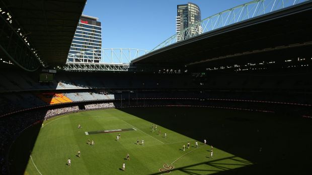 Neither here nor there: the half-open Etihad Stadium roof during Saturday's game.