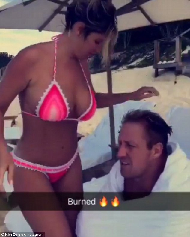 Hot, hot, hot! The blonde bombshell looked extremely tan and nearly burned herself