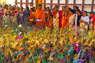 Taken at a Swamy Temple in Harippad, Southern India, during the annual Thaipooyam Festival. Devotees prepare to collect ...