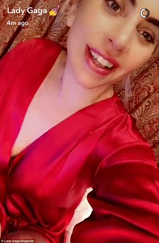 Silky start! The star told fans that she was 'so excited' in a pre-game Snapchat where she was sporting a slinky red robe