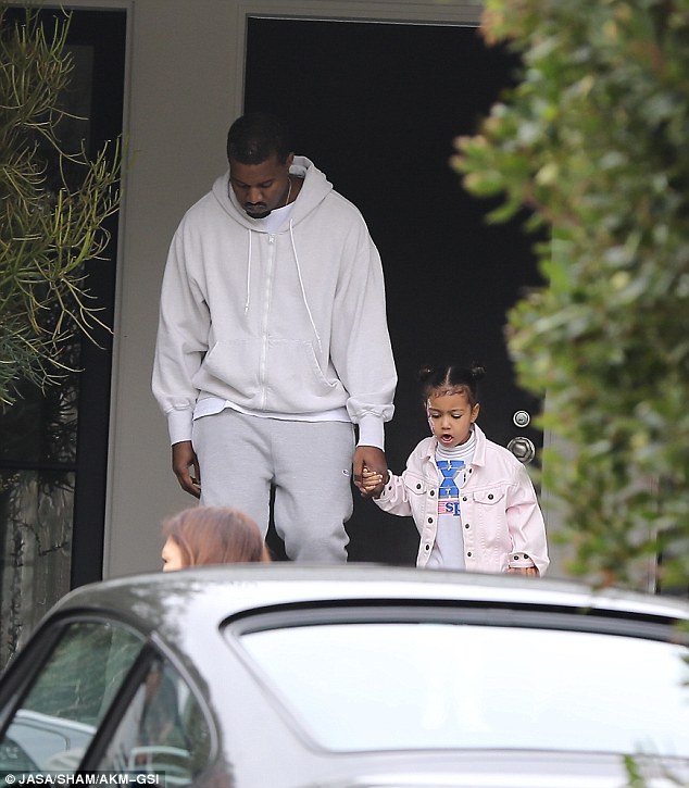 Daddy's girl: Kanye and North at the event