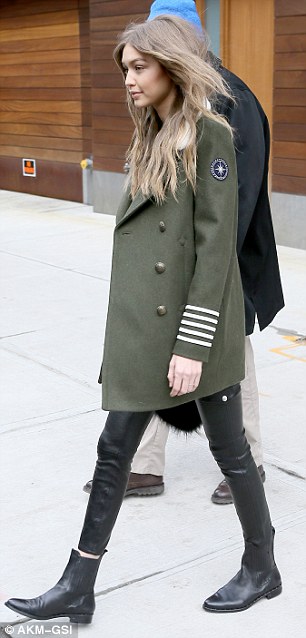 Fab fashionista: The beautiful blonde turned the sidewalk into her own personal runway as she strutted her stuff to a waiting car