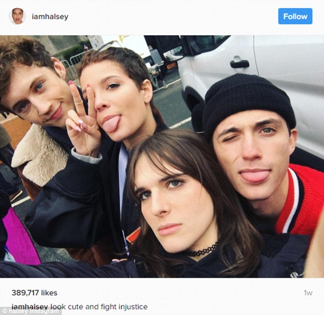 Marching orders: Halsey (second from left) attended the Women's March in Washington DC earlier this month with friends, including singer, Troye Sivan (left)