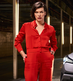 Red hot: Milla Jovovich conquered the catwalk at the world's first drive through immersive theatre experience to promote the new Toyota C-HR