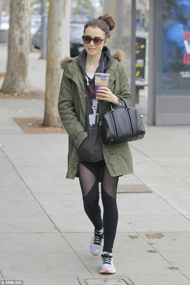 Brunette beauty! Lily Collins showcased her blessed good looks as she stepped out sans make-up in Beverly Hills for a caffeine break on Sunday