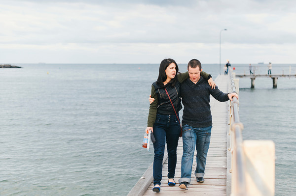 Teen with Down Syndrome and Young Woman on a Jetty