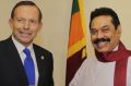 Tony Abbott with then president Mahinda Rajapaksa during a 2013 visit to Sri Lanka.