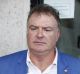 Rod Culleton, with his  Australian Senator pin on display, departs the High Court earlier this week. 