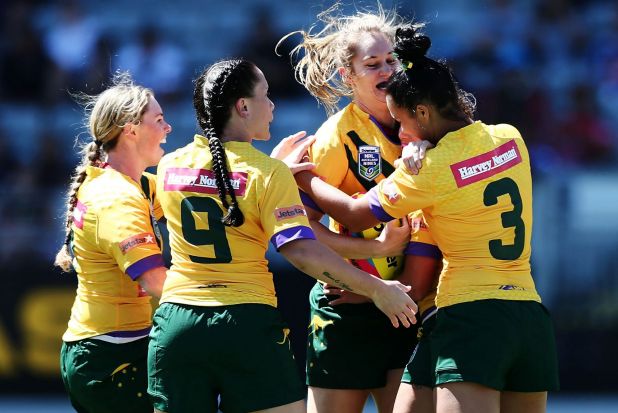 Focused: Australia's Jillaroos celebrate after a try.