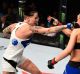 VANCOUVER, BC - AUGUST 27:  (L-R) Bec Rawlings of Australia punches Paige VanZant of the United States in their women's ...