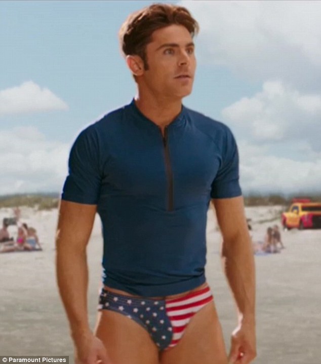 Getting ready to hit the sea for some lifeguard action, The Rock says to Efron: 'Ready?'