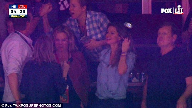 Party people: Gisele looked to be in good spirits