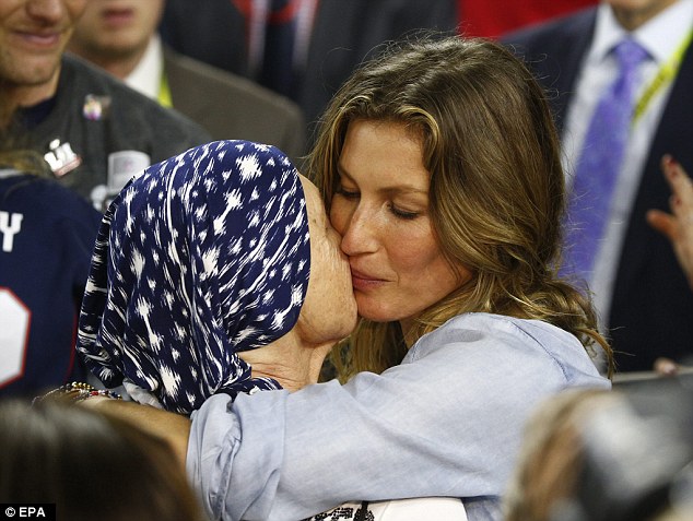 Tight-knit: Gisele also planted a kiss on Galynn