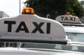 The taxi driver was found by police still bound in Ipswich overnight.