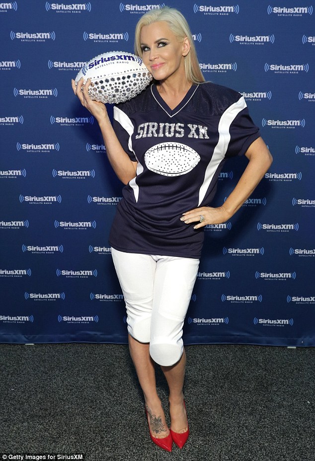 Fashions of the field: Neither Jenny nor Donnie dressed to support either the New England Patriots or the Atlanta Falcons with the radio host donning a SiriusXM branded jersey complete with shoulder pads and padded football pants