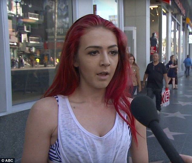 Confused: The woman's pink-haired pal said she was a Trump supporter but was shocked by his 'decision'