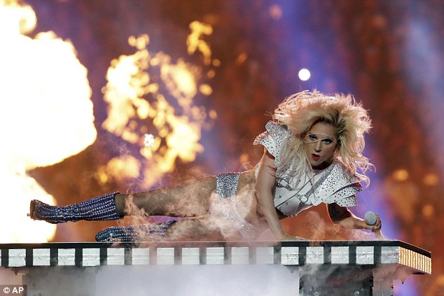 United: Ahead of the show, all eyes were on Lady Gaga to see whether she would use the platform to rip into President Donald Trump at a tense time in US politics, but called for a 'united America' 