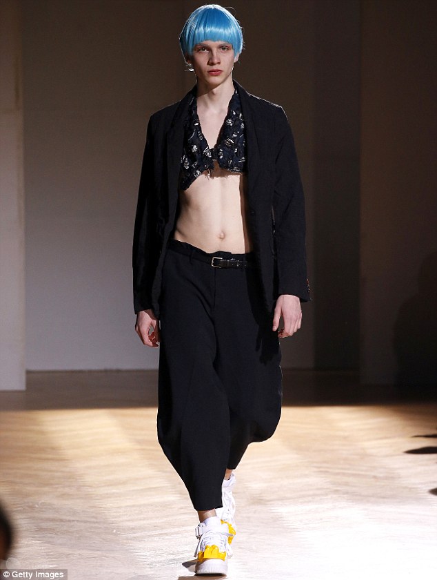 Flaunt it: Comme Des Garcons Homme sent belly baring tops down their fall/winter 2017 runway