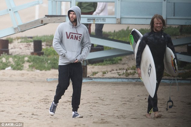 Looked comfortable: The 27-year-old was casually dressed in a Vans grey hooding and navy trackpants