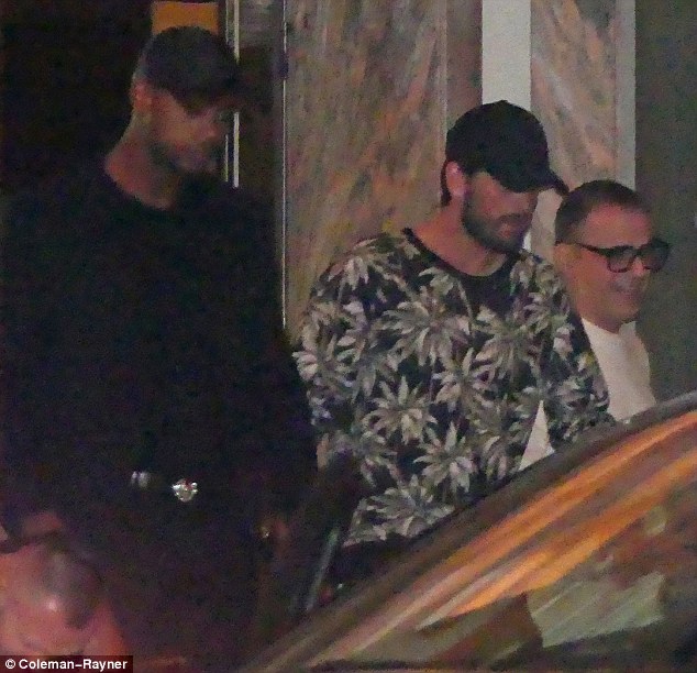 Night on the town: Scott Disick continued his partying ways while stepping out with another gaggle of blonde bombshells while in Miami on Thursday 