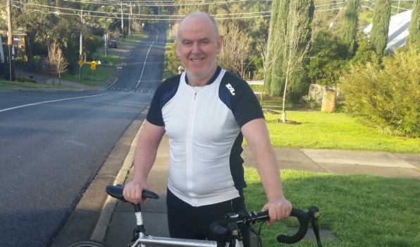 Paul Higgins says he's old and slow – but he still competes in triathlons.