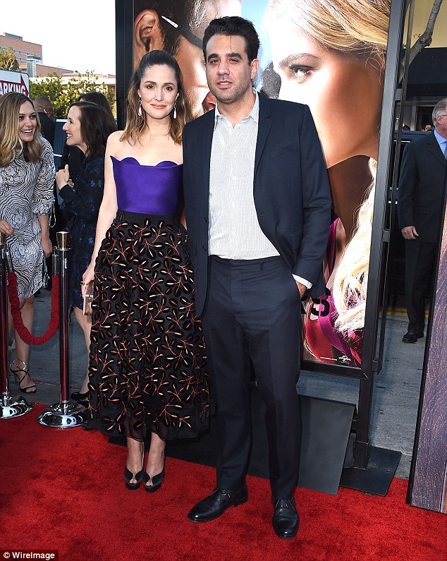  Pressing on: Interestingly, the interviewer pressed on, asking how her Boardwalk Empire star husband Bobby Cannavale would describe her. The Bridesmaids actress replied: 'I'll have to get him to email you. I'm so self-conscious,'