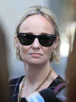 Robyn leaves the Brisbane District Court after her former partner was jailed.