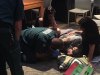 A man injured in a pub fight at th Boulevard Hotel is tended by paramedics. Picture: Michael Stamp