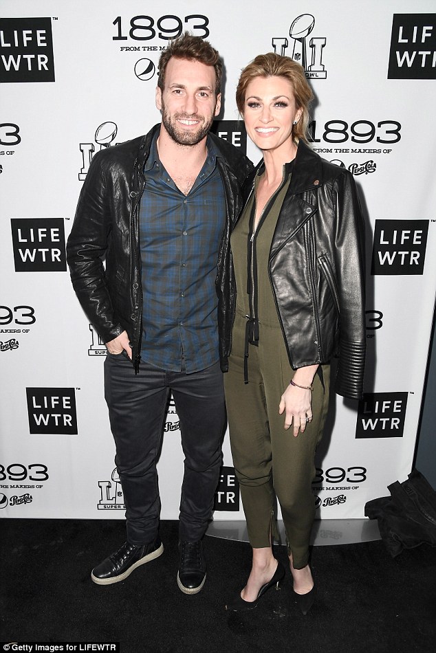 Copycat: On her arm was fiance and NHL player Jarret Stoll, who matched her leather jacket