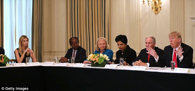 Seat at the table: Ivanka is seen listening to her father at the business council meeting on Friday. From left to right: the first daughter, Global Infrastructure Partners Chairman Adebayo Ogunlesi, IBM CEO Ginni Rometty, PepsiCo CEO Indra Nooyi, Blackstone Group Chairman, CEO Stephen Schwarzman and the president 