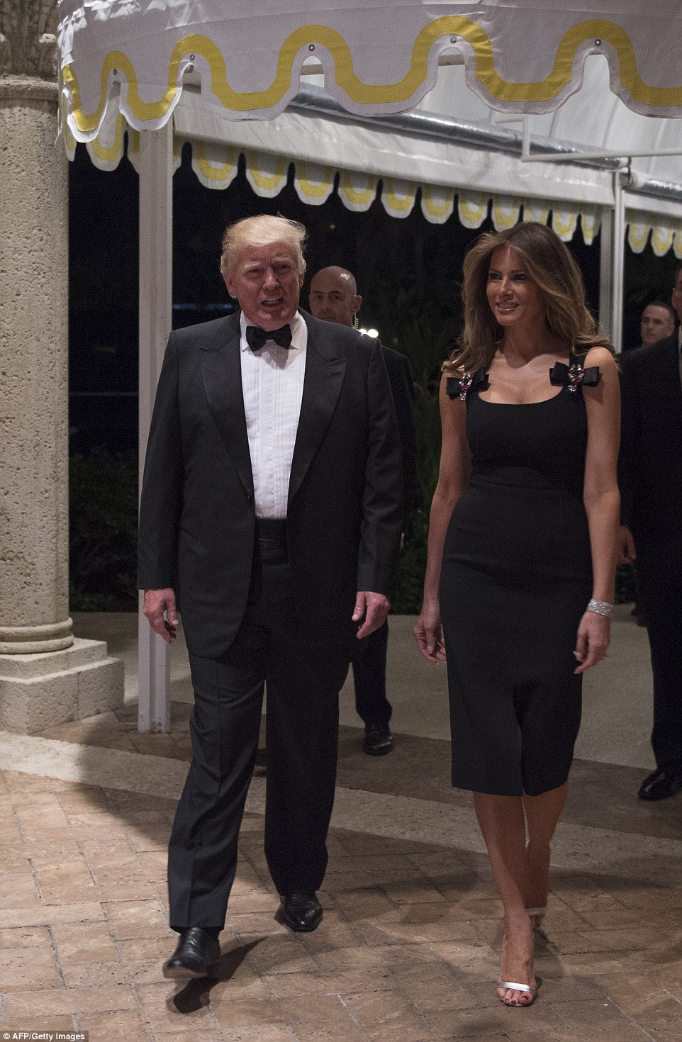 LET'S DO THIS AGAIN: Then-President-elect Donald Trump arrives with his wife Melania for a New Year's Eve party December 31, 2016 at Mar-a-Lago