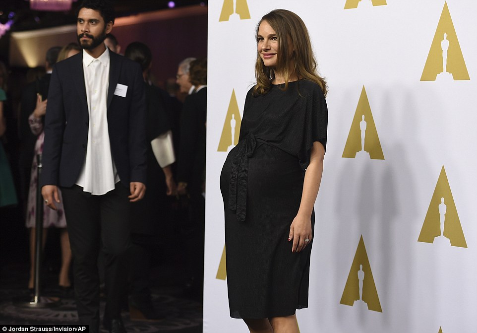 Baby on the way: Natalie, named Best Actress in 2011 for Black Swan, showed off her growing bump in a belted black dress