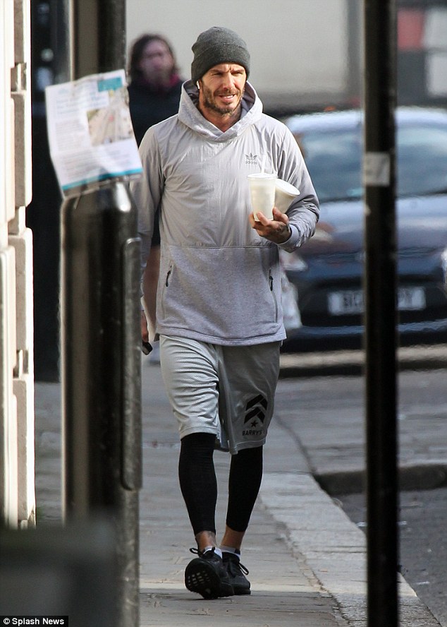 It follows revelations in leaked emails that Beckham’s knighthood was blocked by a ‘red flag’ from the taxman to warn there were issues over his tax. Pictured: Beckham in London today