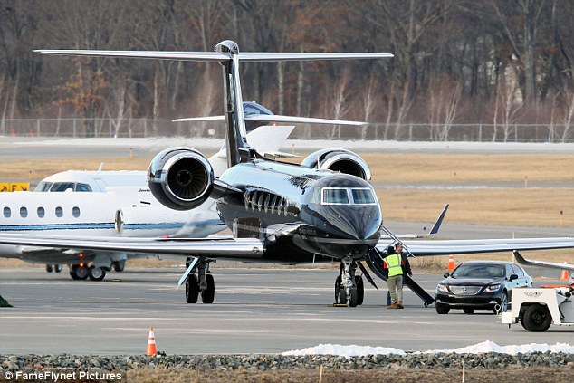  The family traveled in style on an Under Armour plane (pictured) 